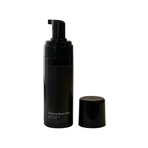 A bottle of black liquid with a black cap, perfect for adding a touch of elegance to any setting.